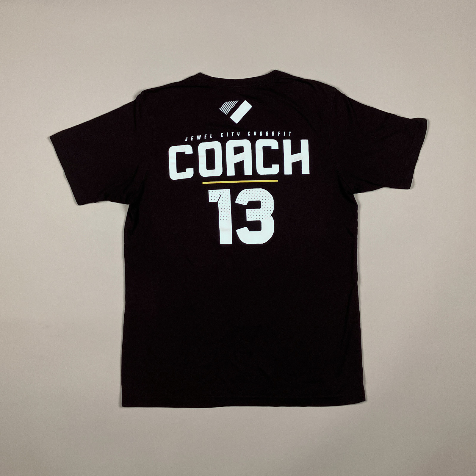 Coach — back